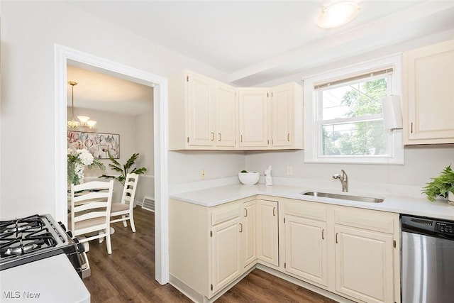 4030 Silsby Rd, University Heights, OH 44118 - kitchen featuring stainless steel dishwasher, range with gas cooktop, and light countertops