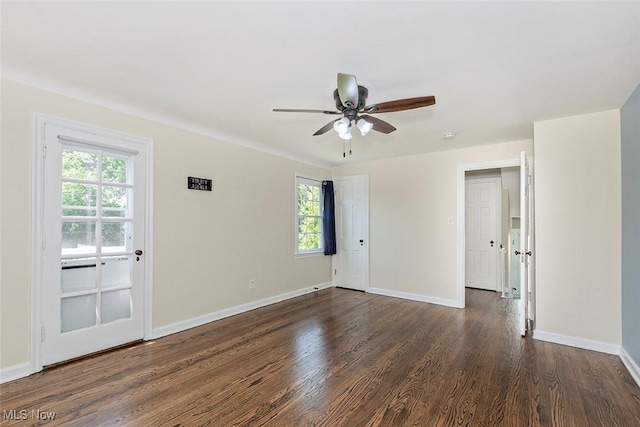 4030 Silsby Rd, University Heights, OH 44118 - empty room featuring ceiling fan and dark wood-type flooring
