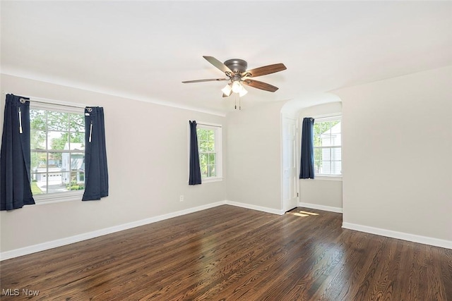 4030 Silsby Rd, University Heights, OH 44118 - spare room featuring healthy amount of natural light, dark wood-style floors, and a ceiling fan