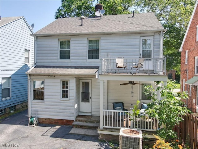 3622 Northcliffe Rd, University Heights, OH 44118 - rear view of property featuring a balcony, a ceiling fan, roof with shingles, a chimney, and a patio area
