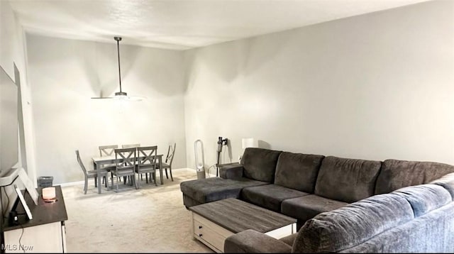 7135 N Holmes Pl, Concord, OH 44077 - carpeted living area featuring lofted ceiling and ceiling fan