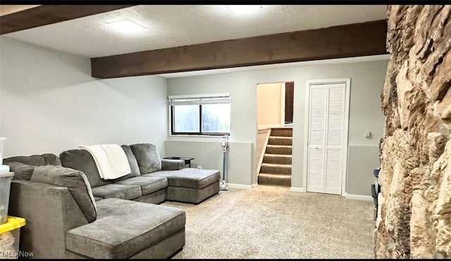 7135 N Holmes Pl, Concord, OH 44077 - living room featuring carpet flooring, stairs, and beam ceiling