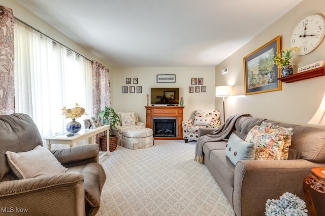 2207 Robinhood Dr, Wooster, OH 44691 - living room with light colored carpet and a fireplace