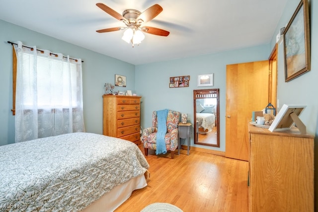 2207 Robinhood Dr, Wooster, OH 44691 - bedroom with light wood-type flooring and ceiling fan