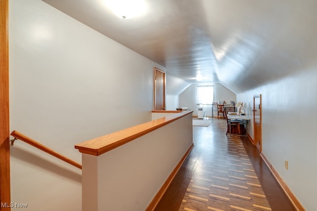 2207 Robinhood Dr, Wooster, OH 44691 - corridor featuring an upstairs landing, lofted ceiling, and dark wood finished floors