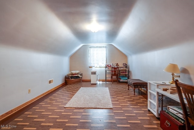 2207 Robinhood Dr, Wooster, OH 44691 - additional living space with lofted ceiling and wood finished floors