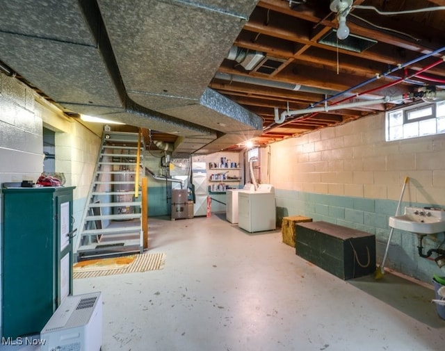 2207 Robinhood Dr, Wooster, OH 44691 - below grade area with stairway, washing machine and dryer, heating unit, and concrete block wall