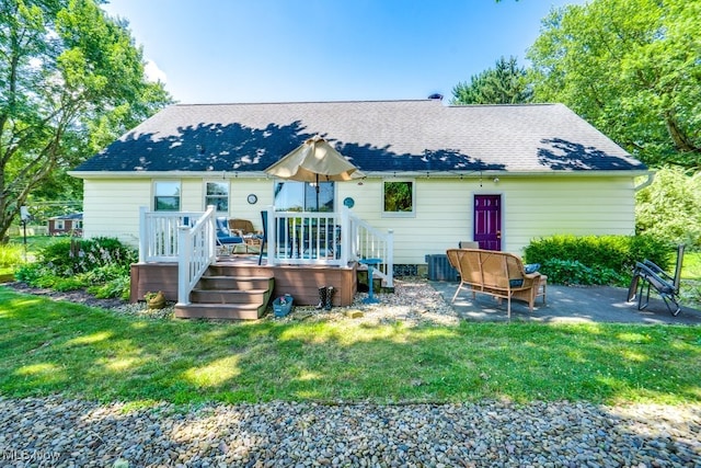 2207 Robinhood Dr, Wooster, OH 44691 - rear view of property featuring a yard, a wooden deck, and roof with shingles