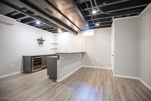 31008 Logan Ct, Westlake, OH 44145 - indoor wet bar featuring wine cooler and light wood-style flooring