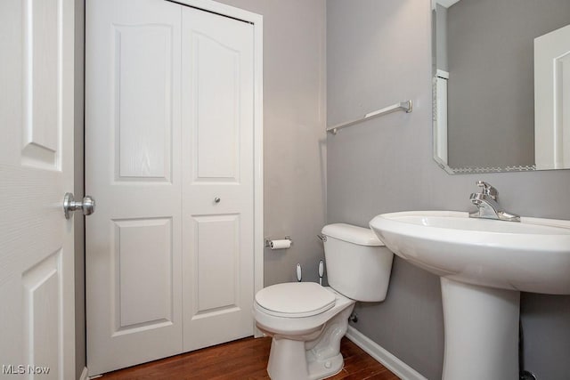 31008 Logan Ct, Westlake, OH 44145 - half bathroom featuring wood finished floors and toilet