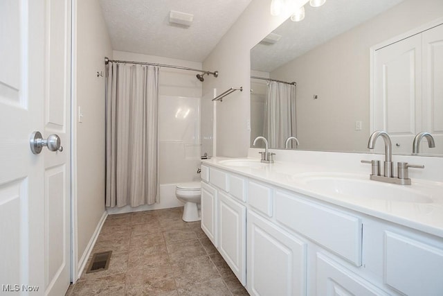 31008 Logan Ct, Westlake, OH 44145 - bathroom with double vanity, shower / tub combo with curtain, and a textured ceiling