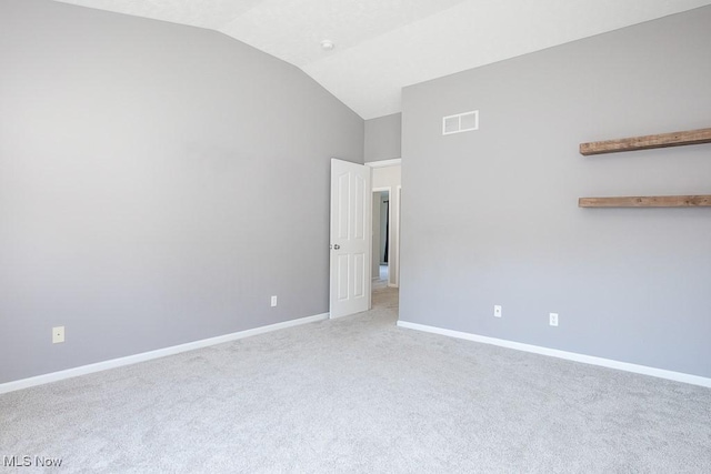 31008 Logan Ct, Westlake, OH 44145 - unfurnished room with vaulted ceiling and carpet