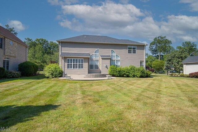 31008 Logan Ct, Westlake, OH 44145 - rear view of property with a yard and a patio