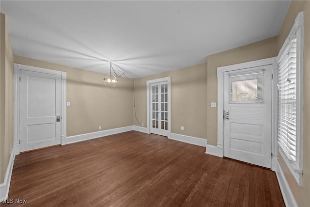 2905 Jay Ave, Cleveland, OH 44113 - foyer with wood finished floors and a chandelier