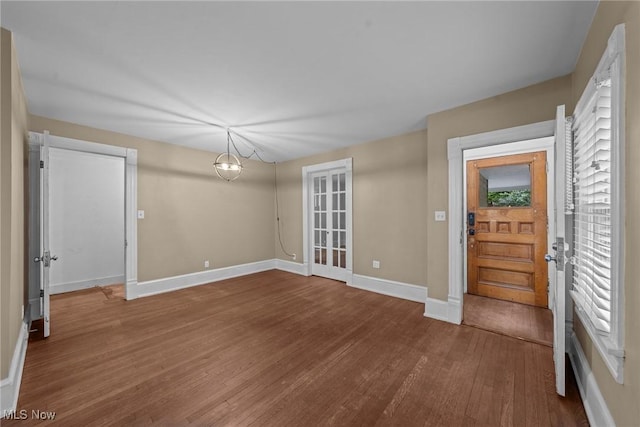 2905 Jay Ave, Cleveland, OH 44113 - entryway with wood finished floors and a chandelier