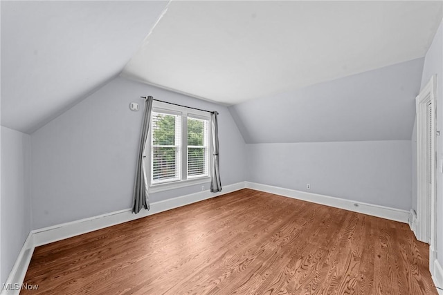 2905 Jay Ave, Cleveland, OH 44113 - bonus room featuring vaulted ceiling and wood finished floors