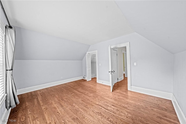 2905 Jay Ave, Cleveland, OH 44113 - additional living space with wood finished floors and vaulted ceiling
