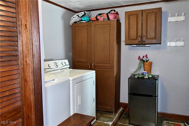 1511 Lake Front Dr, Salem, OH 44460 - laundry room featuring separate washer and dryer, cabinet space, and ornamental molding