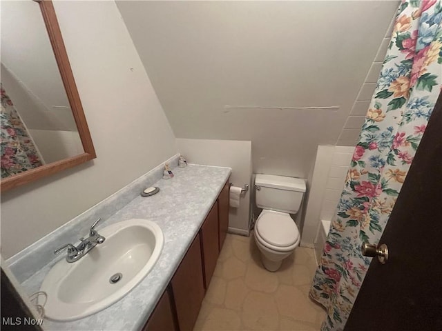 10247 Smugglers Cv, Reminderville, OH 44202 - bathroom featuring vanity, shower / bath combo with shower curtain, and tile patterned flooring