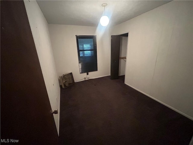 10247 Smugglers Cv, Reminderville, OH 44202 - empty room with dark carpet and baseboards