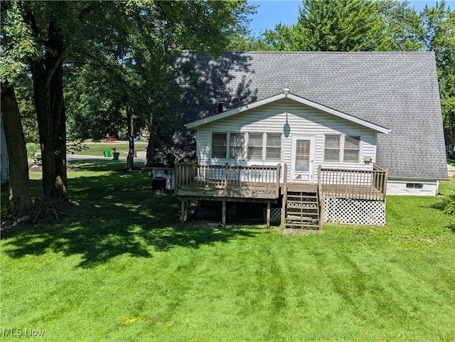 10247 Smugglers Cv, Reminderville, OH 44202 - rear view of property with a wooden deck, a yard, stairway, and a shingled roof