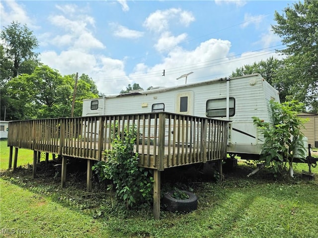 99 E Apple Blossom Way, Elizabeth, WV 26143 - rear view of property featuring a wooden deck and a yard