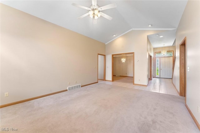 7900 Walnut St Unit 10, Boardman, OH 44512 - spare room with light colored carpet, light tile patterned floors, ceiling fan, and high vaulted ceiling