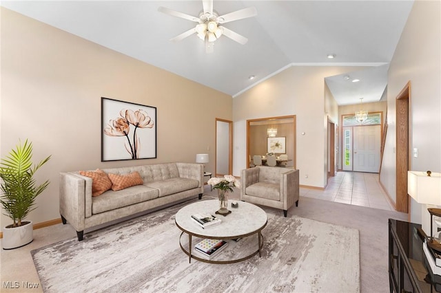 7900 Walnut St Unit 10, Boardman, OH 44512 - living area with light carpet, vaulted ceiling, a ceiling fan, and light tile patterned floors