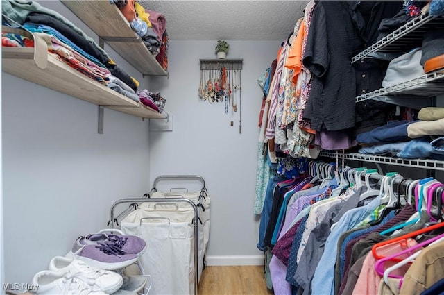 1921 Adrian Cir, Sandusky, OH 44870 - spacious closet featuring wood finished floors