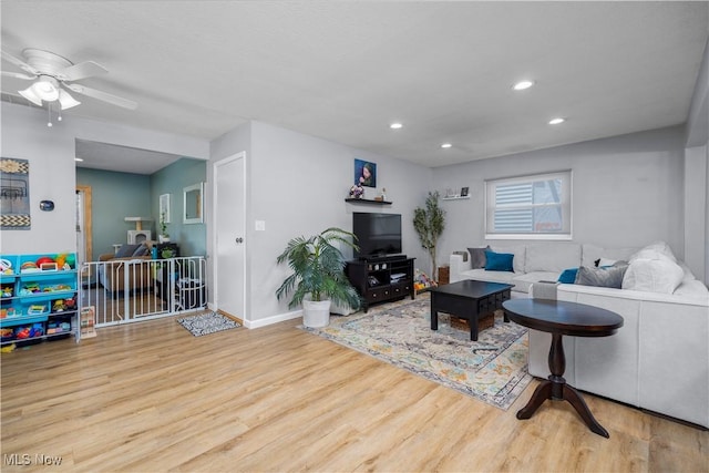 1921 Adrian Cir, Sandusky, OH 44870 - living area featuring wood finished floors, recessed lighting, and a ceiling fan