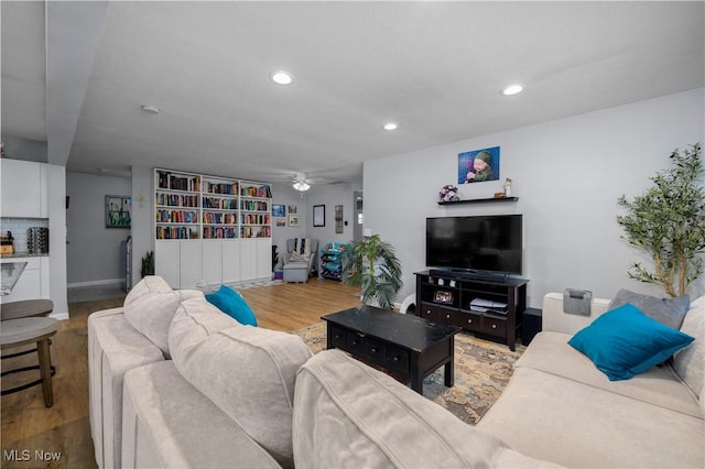1921 Adrian Cir, Sandusky, OH 44870 - living room featuring ceiling fan, recessed lighting, and wood finished floors
