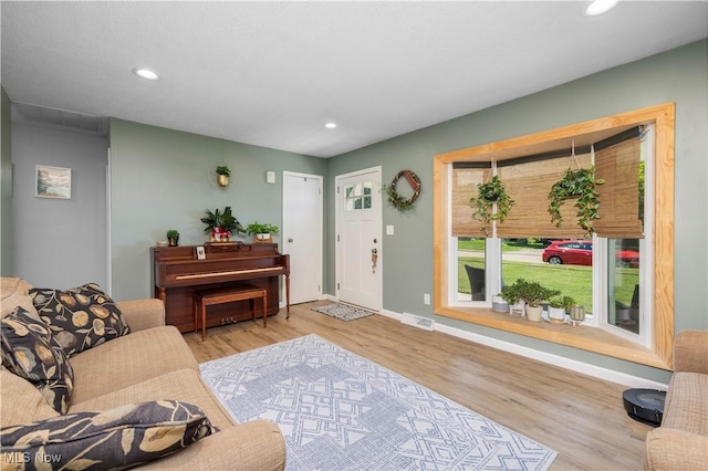 1921 Adrian Cir, Sandusky, OH 44870 - living area with recessed lighting and wood finished floors