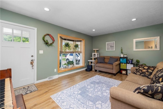 1921 Adrian Cir, Sandusky, OH 44870 - living area with wood finished floors and recessed lighting