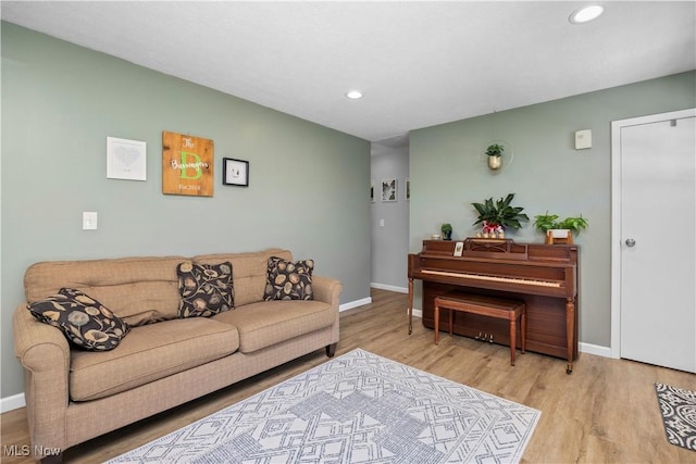 1921 Adrian Cir, Sandusky, OH 44870 - living area featuring wood finished floors and recessed lighting