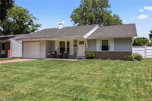 1921 Adrian Cir, Sandusky, OH 44870 - ranch-style house with an attached garage, driveway, a chimney, roof with shingles, and brick siding