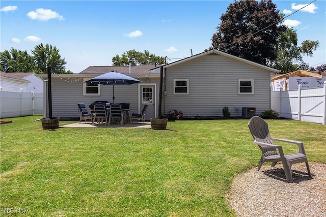 1921 Adrian Cir, Sandusky, OH 44870 - rear view of house with a patio area and a fenced backyard