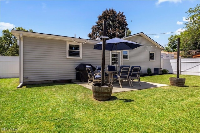 1921 Adrian Cir, Sandusky, OH 44870 - back of property featuring a fenced backyard and a patio