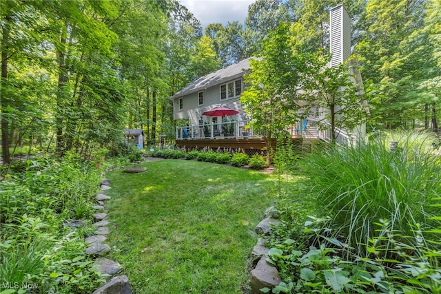 949 S Medina Line Rd, Wadsworth, OH 44281 - view of green lawn with a wooden deck