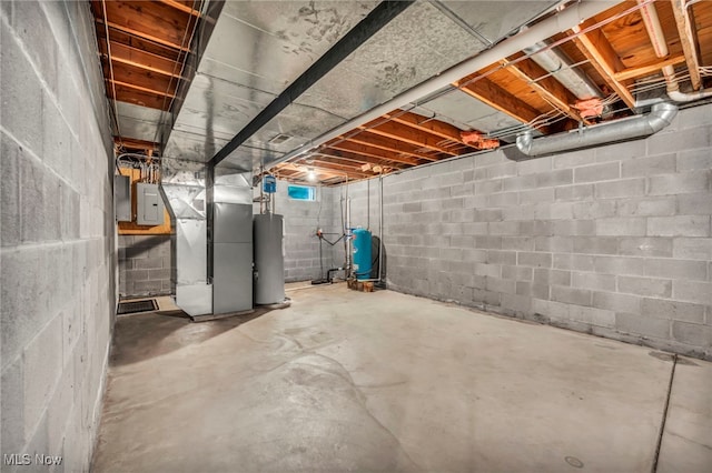 949 S Medina Line Rd, Wadsworth, OH 44281 - unfinished below grade area with a water pressure tank, water heater, heating unit, and electric panel