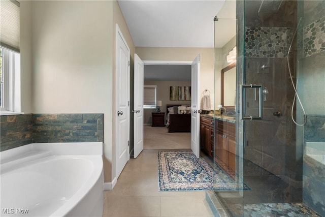 4276 Brownstone Ln, Medina, OH 44256 - full bathroom with a shower stall, a garden tub, vanity, and tile patterned floors