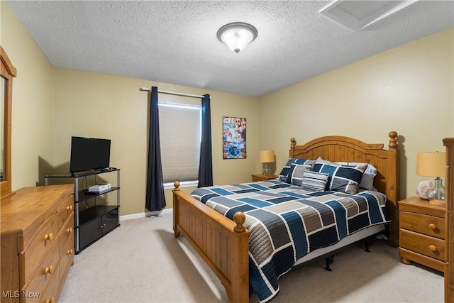 4276 Brownstone Ln, Medina, OH 44256 - bedroom with light carpet, attic access, and a textured ceiling