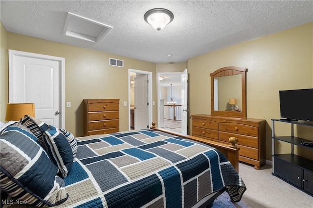 4276 Brownstone Ln, Medina, OH 44256 - bedroom with attic access, light carpet, and a textured ceiling
