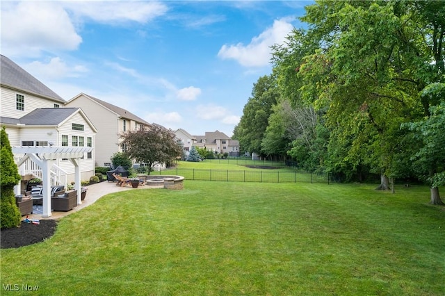 4276 Brownstone Ln, Medina, OH 44256 - fenced backyard with a pergola, a patio, and an outdoor living space with a fire pit