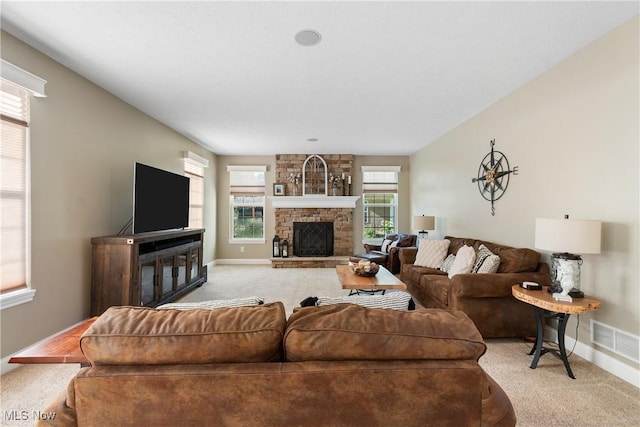 4276 Brownstone Ln, Medina, OH 44256 - living area with light carpet and a stone fireplace