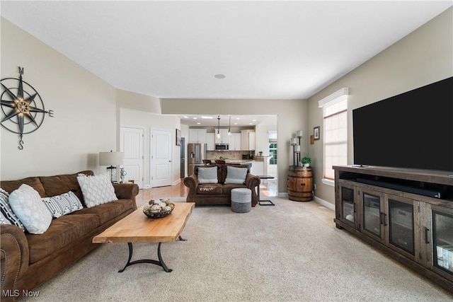 4276 Brownstone Ln, Medina, OH 44256 - living area featuring light carpet and baseboards