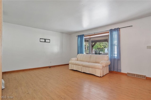662 Beech Ave, Youngstown, OH 44512 - living room featuring wood finished floors