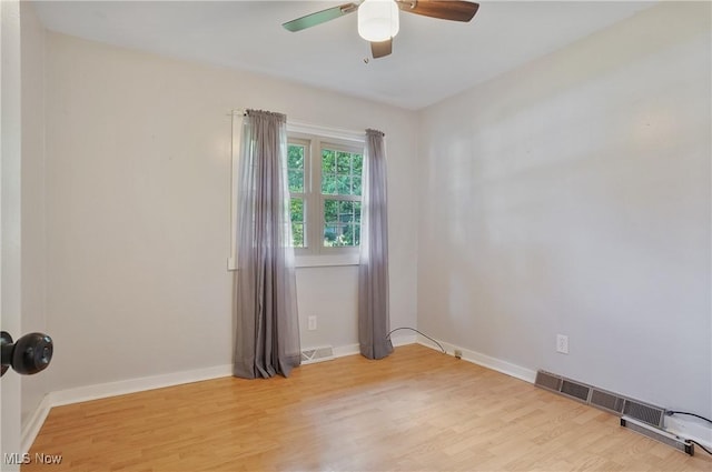 662 Beech Ave, Youngstown, OH 44512 - unfurnished room featuring ceiling fan and light wood-style flooring