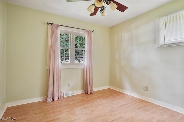 662 Beech Ave, Youngstown, OH 44512 - empty room featuring wood finished floors and a ceiling fan