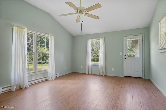 662 Beech Ave, Youngstown, OH 44512 - spare room with lofted ceiling, wood finished floors, baseboard heating, and ceiling fan