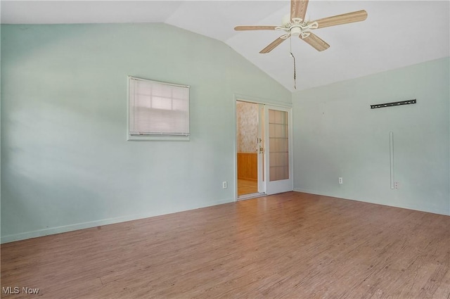 662 Beech Ave, Youngstown, OH 44512 - spare room with lofted ceiling, a ceiling fan, and wood finished floors